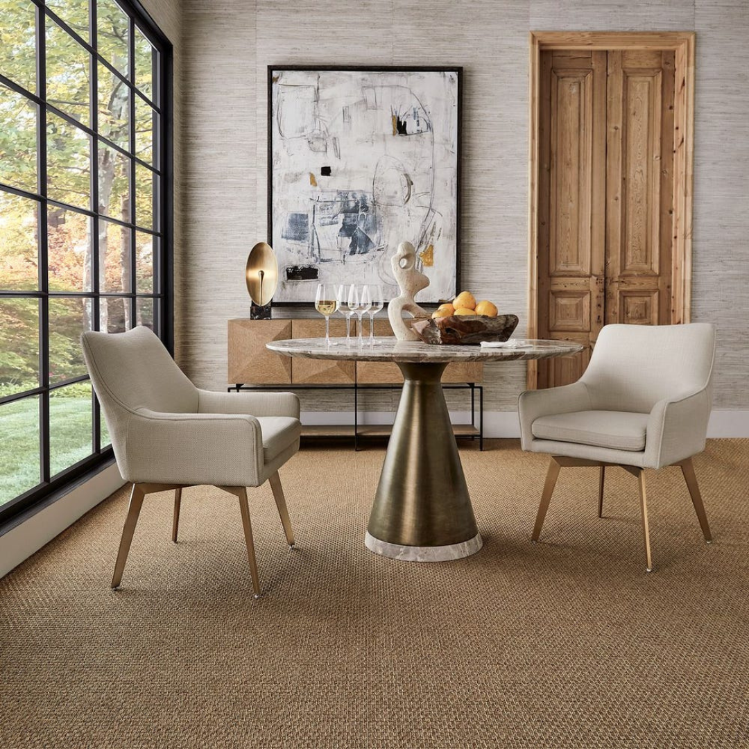 Luxury round marble dining table with pedestal base in modern Denver home